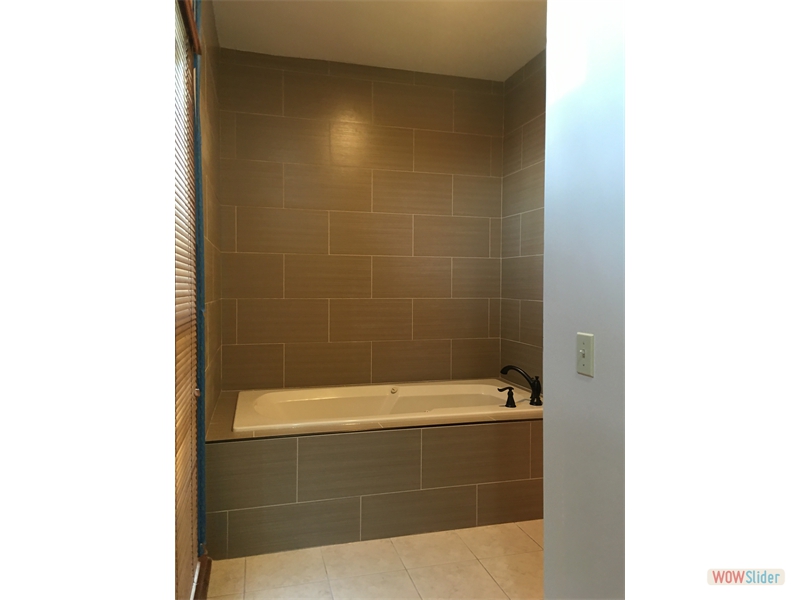 Re-tiled tub and surround